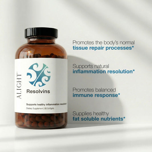 Supplement bottle labeled 'ALIGHT Resolvins' with text about health benefits on a white background