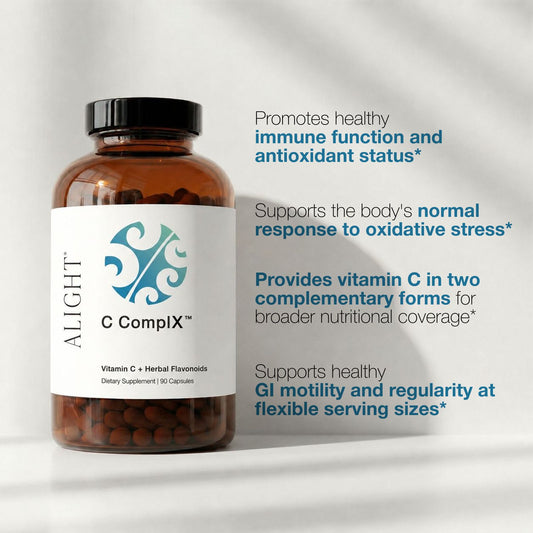 An amber supplement bottle labeled ALIGHT C Complex with a black cap and white label, shown beside marketing text on a light gray background.