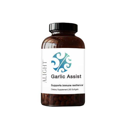 Dietary supplement bottle labeled 'Garlic Assist' by ALIGHT on a white background