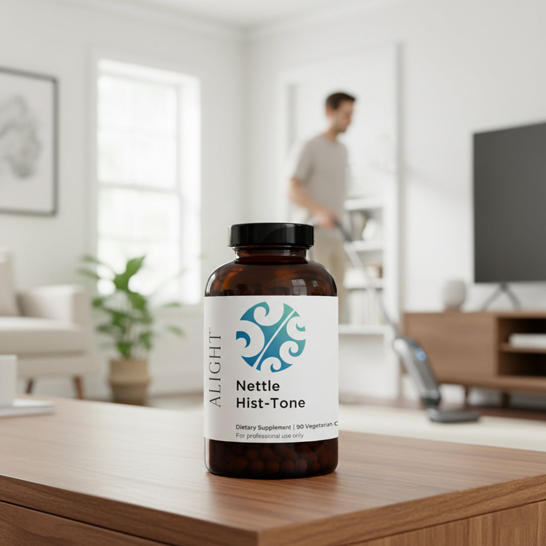 Bottle of Nettle Hist-Tone supplement on a table with a blurred living room background